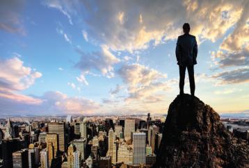 Business man overlooking city